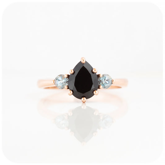 black pear cut spinel and round cut aquamarine trilogy style engagement ring in rose gold - Victoria's Jewellery