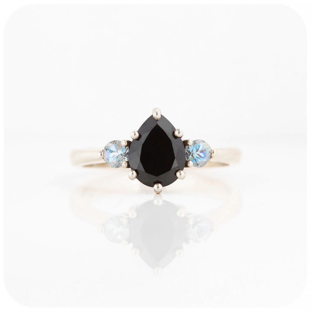 black pear cut spinel and round cut aquamarine trilogy style engagement ring in white gold - Victoria's Jewellery