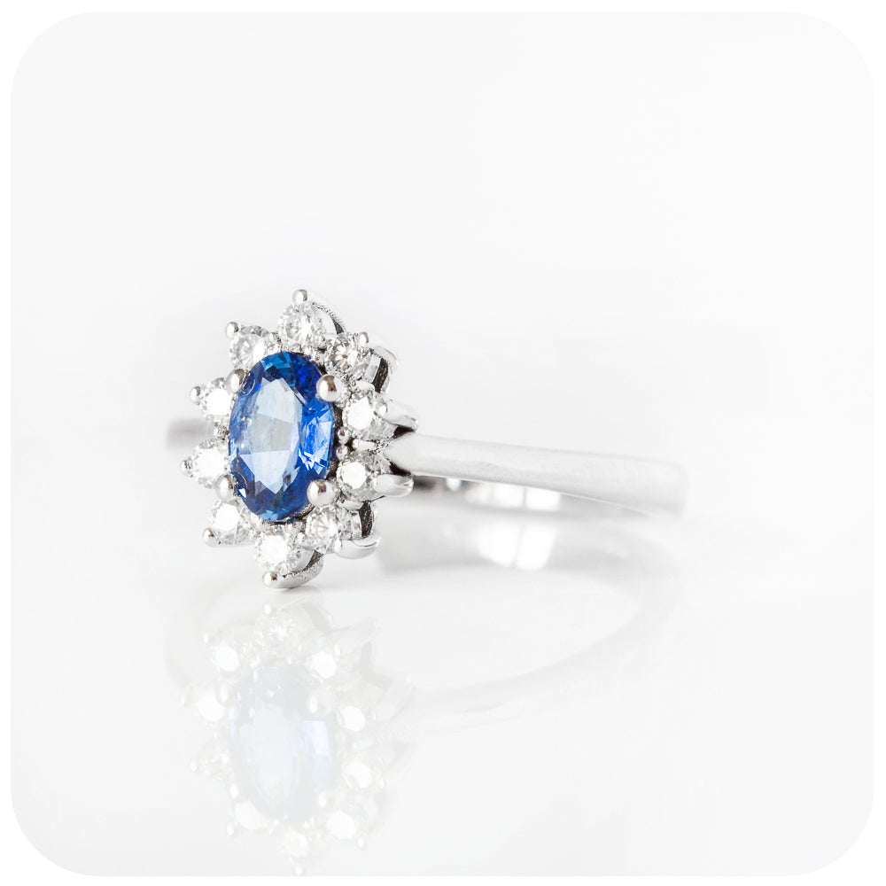 Eva, a Blue Sapphire and Diamond Halo Ring