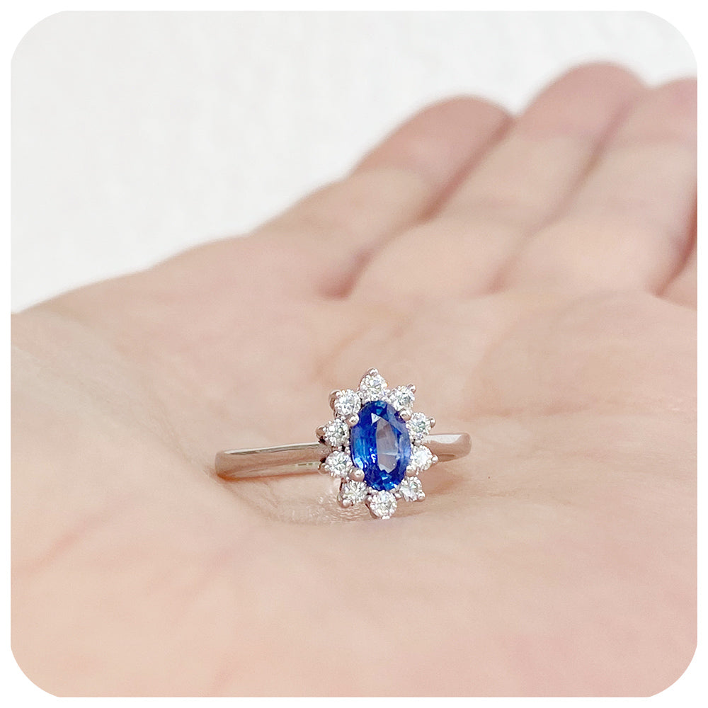 Eva, a Blue Sapphire and Diamond Halo Ring