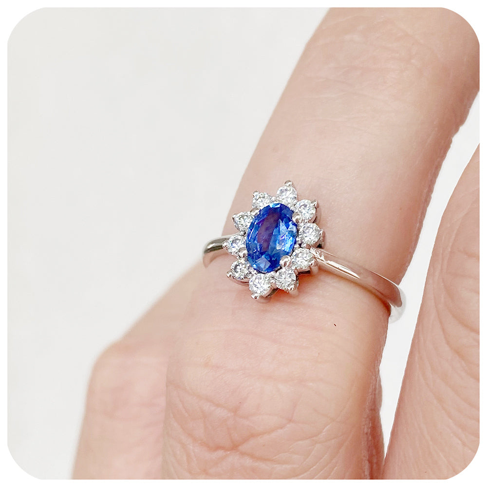 Eva, a Blue Sapphire and Diamond Halo Ring