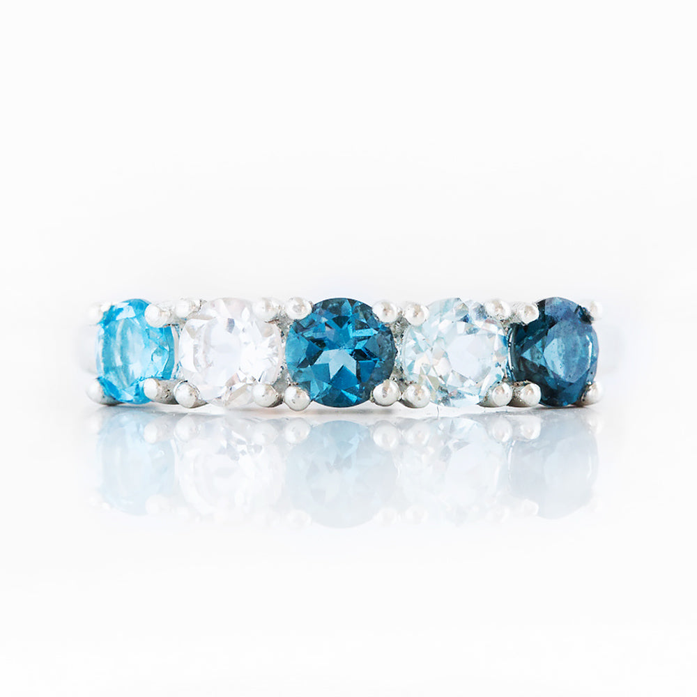 Round cut Blue Topaz half eternity anniversary ring - Victoria's Jewellery
