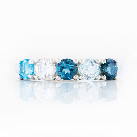 Round cut Blue Topaz half eternity anniversary ring - Victoria's Jewellery