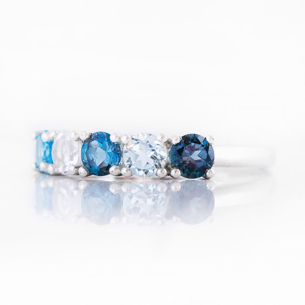 Round cut Blue Topaz half eternity anniversary ring - Victoria's Jewellery