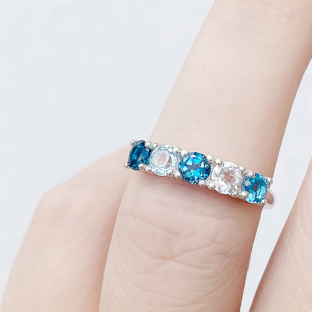 Round cut Blue Topaz half eternity anniversary ring - Victoria's Jewellery