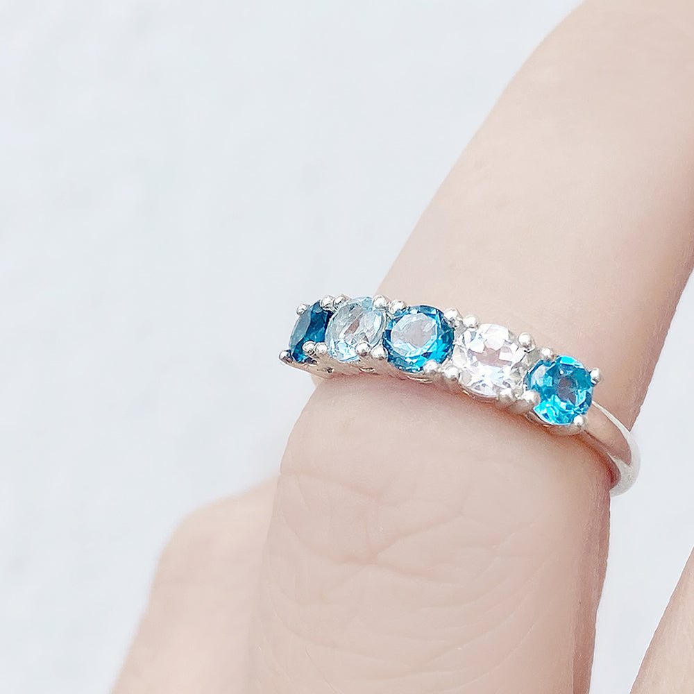 Round cut Blue Topaz half eternity anniversary ring - Victoria's Jewellery