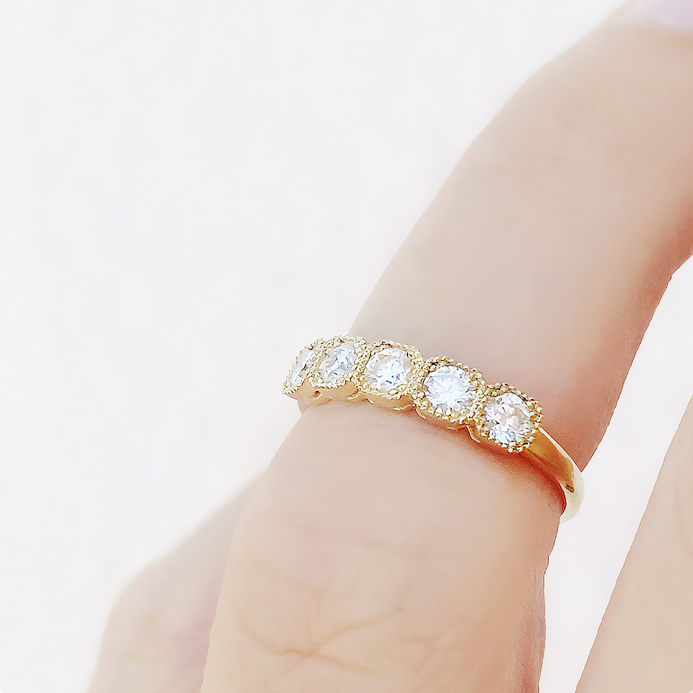 Zelrese, a Mined Diamond Half Eternity Ring