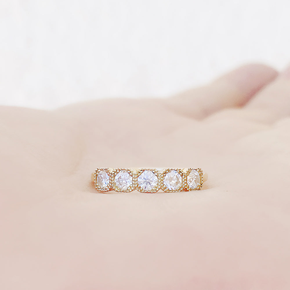 Zelrese, a Mined Diamond Half Eternity Ring
