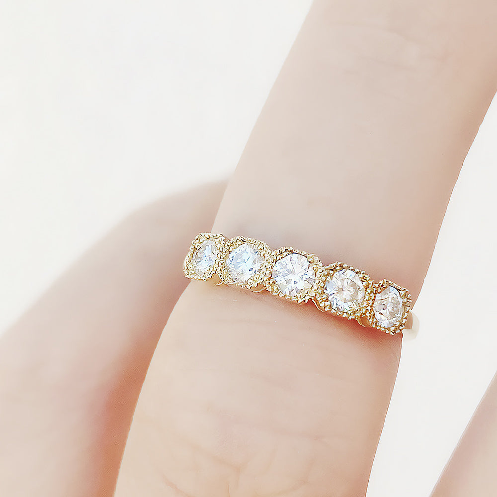 Zelrese, a Mined Diamond Half Eternity Ring