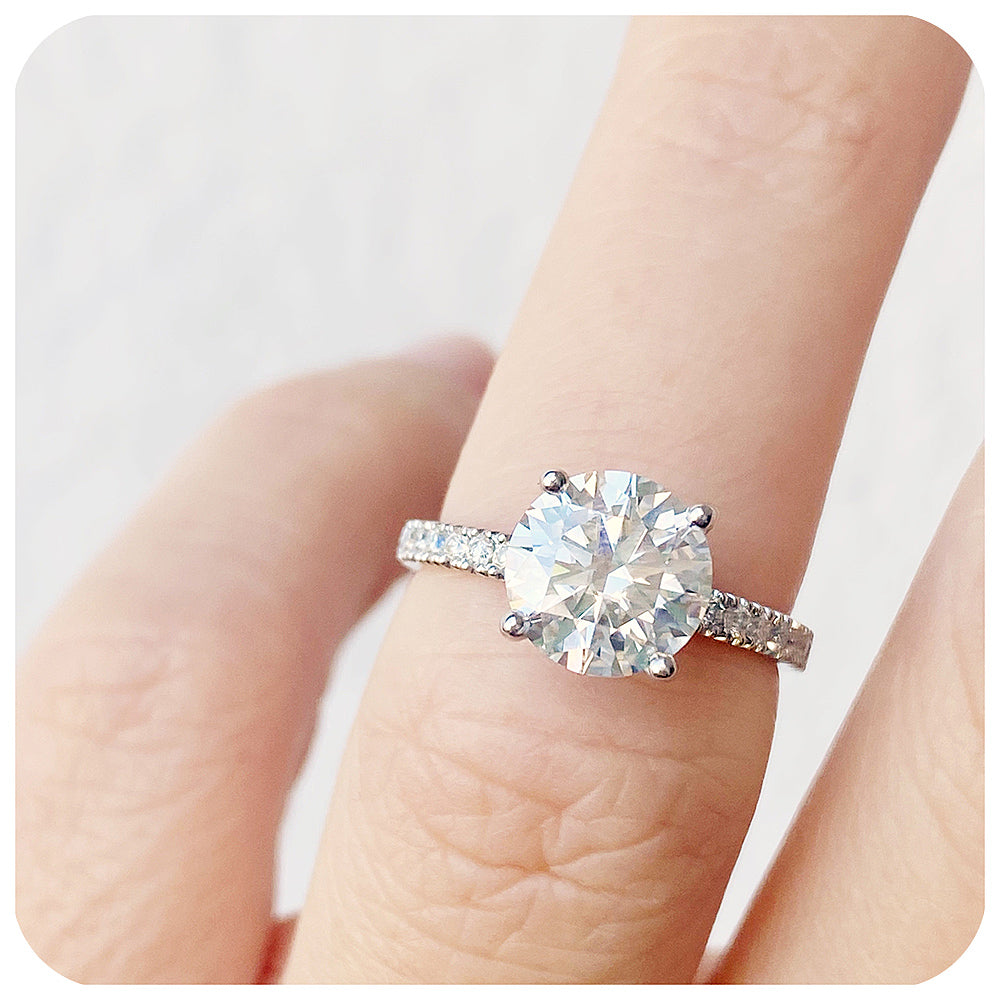 brilliant round cut moissanite engagement ring with moissanite accent stones - Victoria's Jewellery