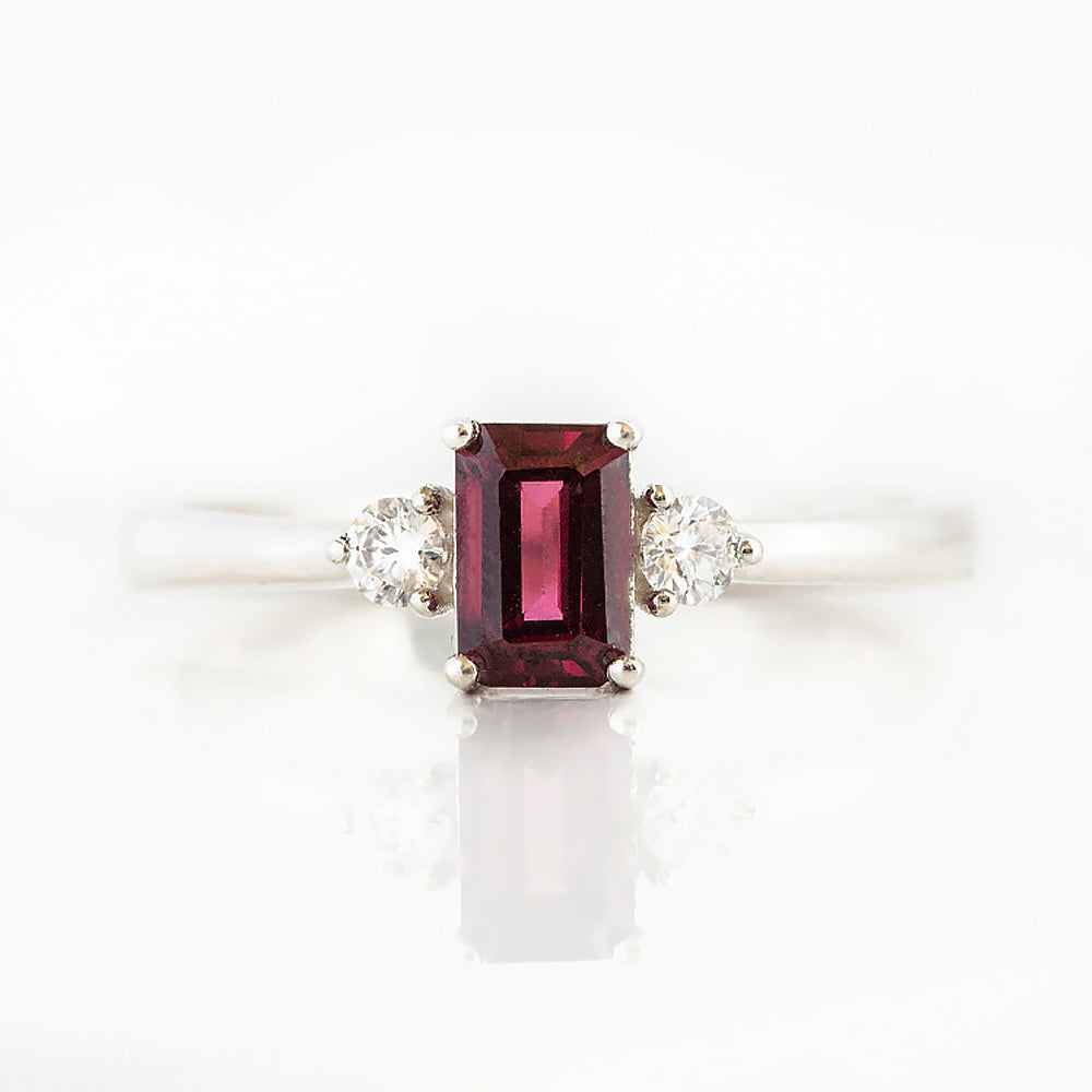 Emerald cut Rhodolite and Diamond trilogy engagement ring - Victoria's Jewellery