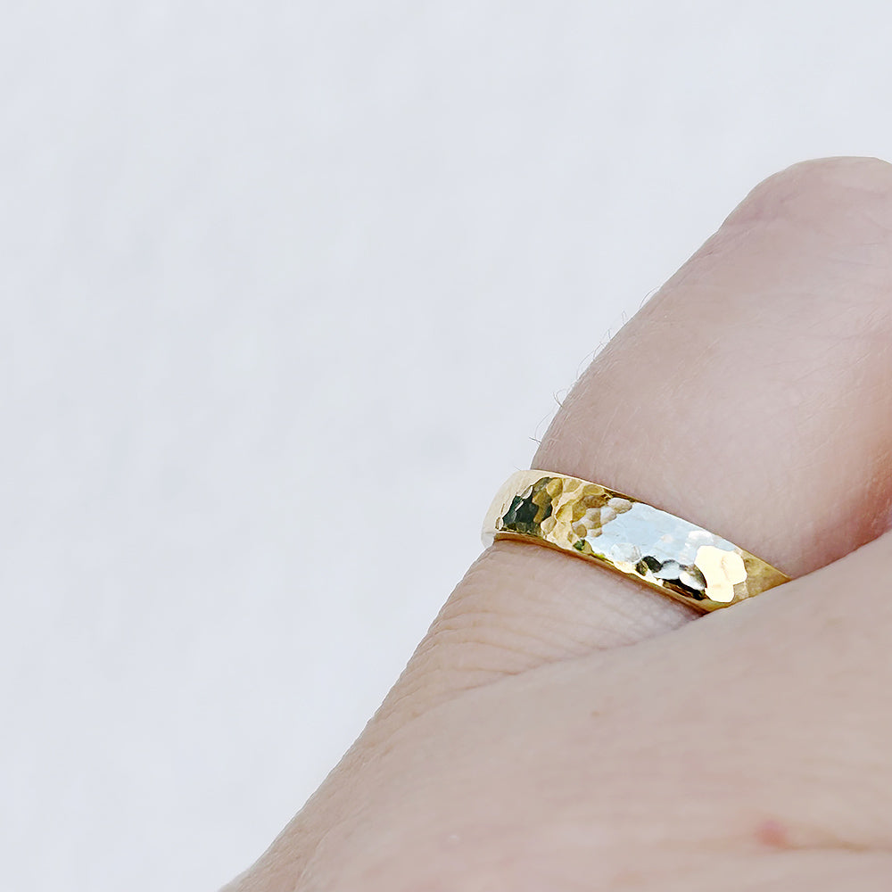 James, a Men's Comfort Fit Gold Wedding Band - Hammered