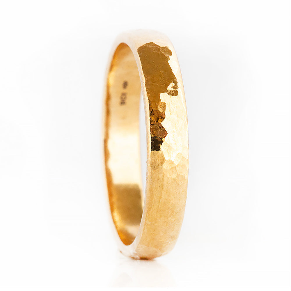 James, a Men's Comfort Fit Gold Wedding Band - Hammered