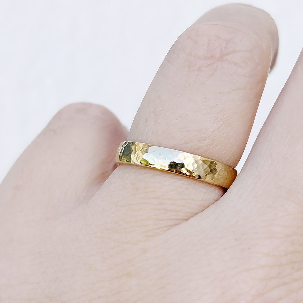 James, a Men's Comfort Fit Gold Wedding Band - Hammered