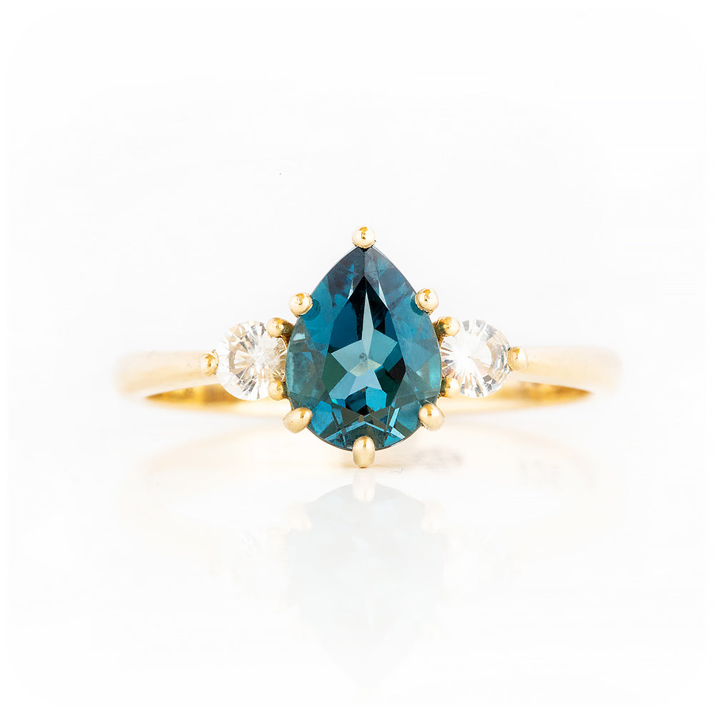 Pear cut London Blue Topaz and Diamond Trilogy Engagement Ring in Yellow Gold - Victoria's Jewellery
