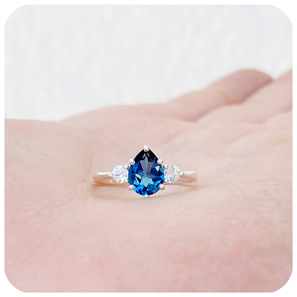 Pear cut London Blue Topaz and White Sapphire Trilogy Engagement Ring in White Gold - Victoria's Jewellery