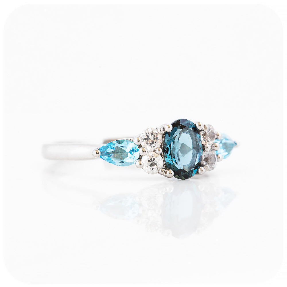 sapphire and topaz anniversary or engagement ring with trellis design