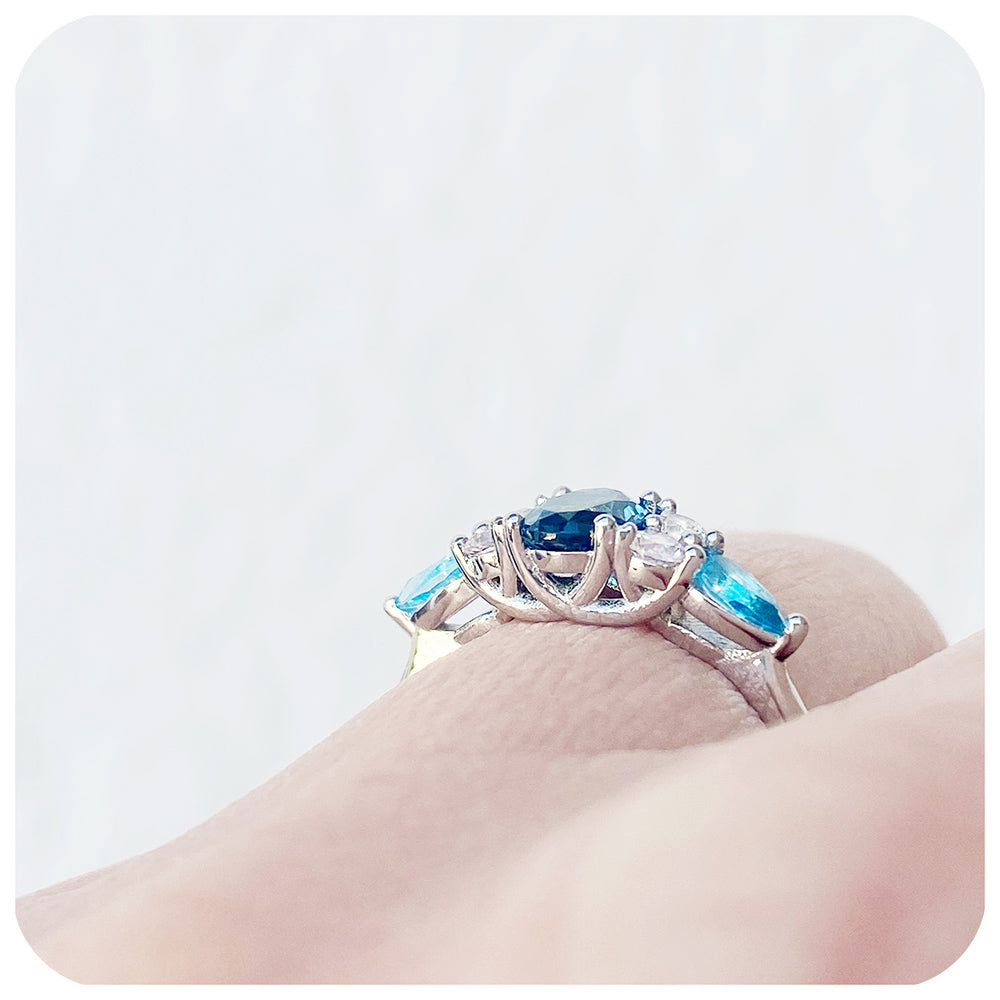 sapphire and topaz anniversary or engagement ring with trellis design