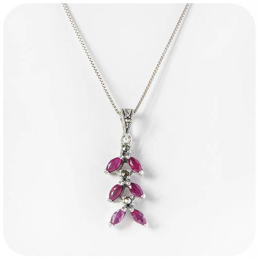marquise cut ruby pendant and chain with a vintage inspired look