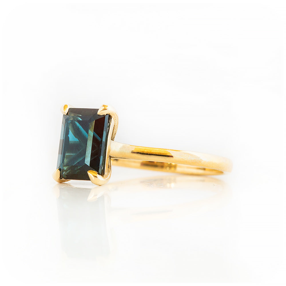 Emerald cut London Blue Topaz Solitaire Ring in Yellow Gold - Victoria's Jewellery