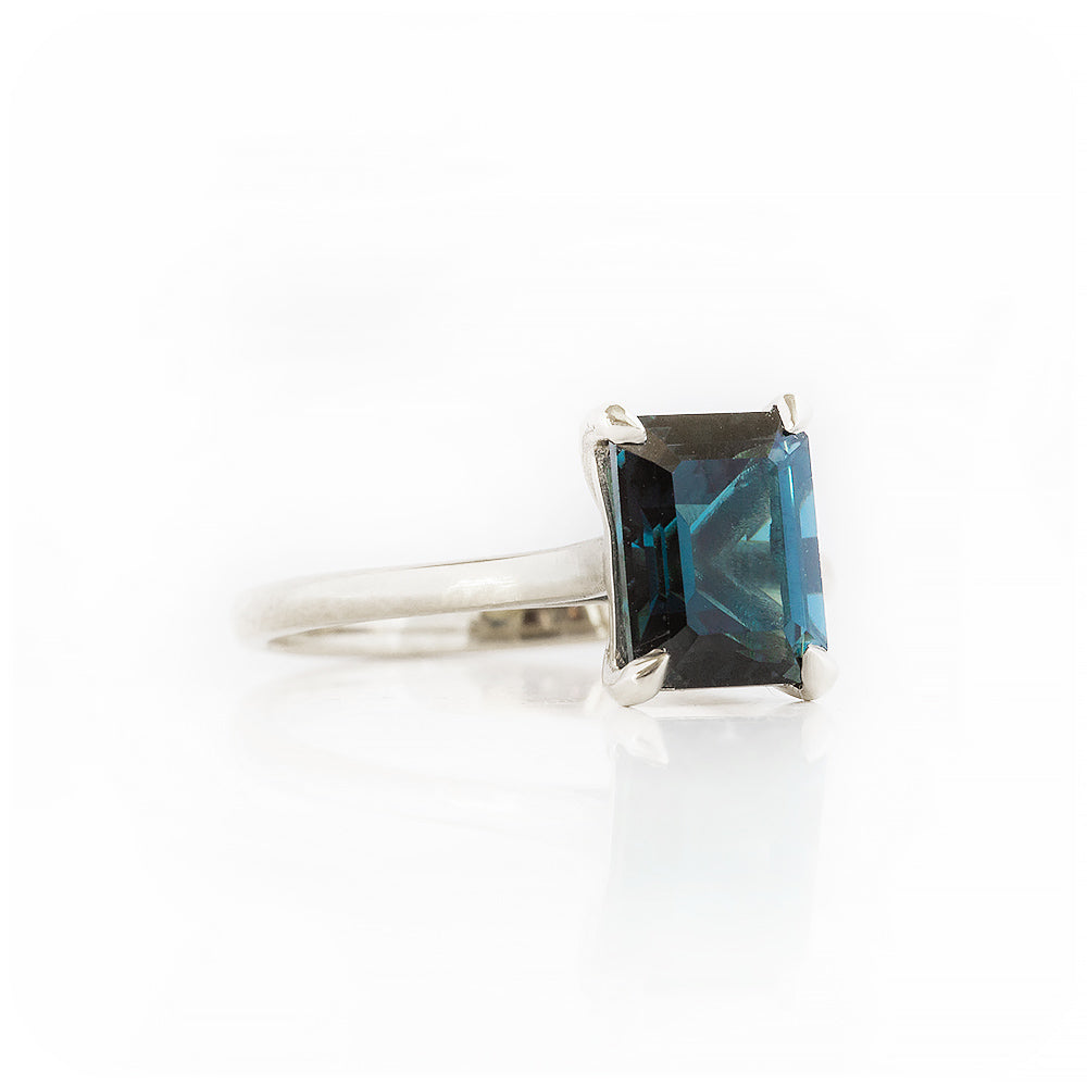 Emerald cut London Blue Topaz Solitaire Ring in White Gold - Victoria's Jewellery