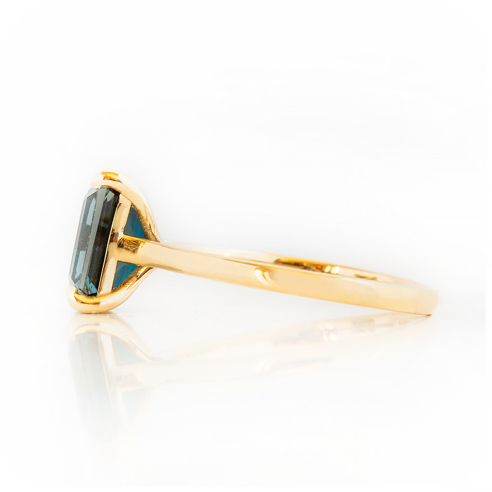 Emerald cut London Blue Topaz Solitaire Ring in Yellow Gold - Victoria's Jewellery