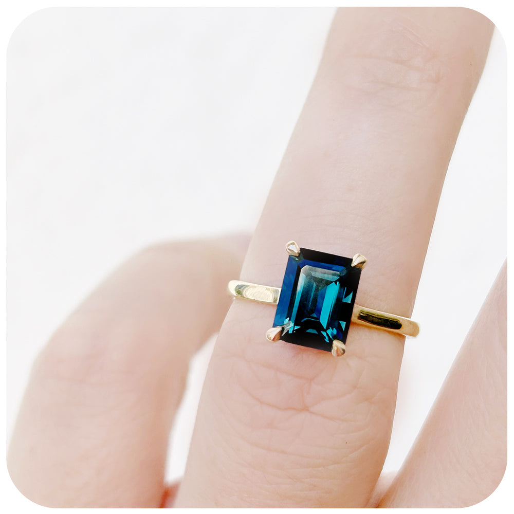 Emerald cut London Blue Topaz Solitaire Ring in Yellow Gold - Victoria's Jewellery