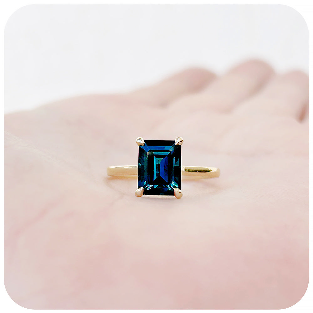 Emerald cut London Blue Topaz Solitaire Ring in Yellow Gold - Victoria's Jewellery