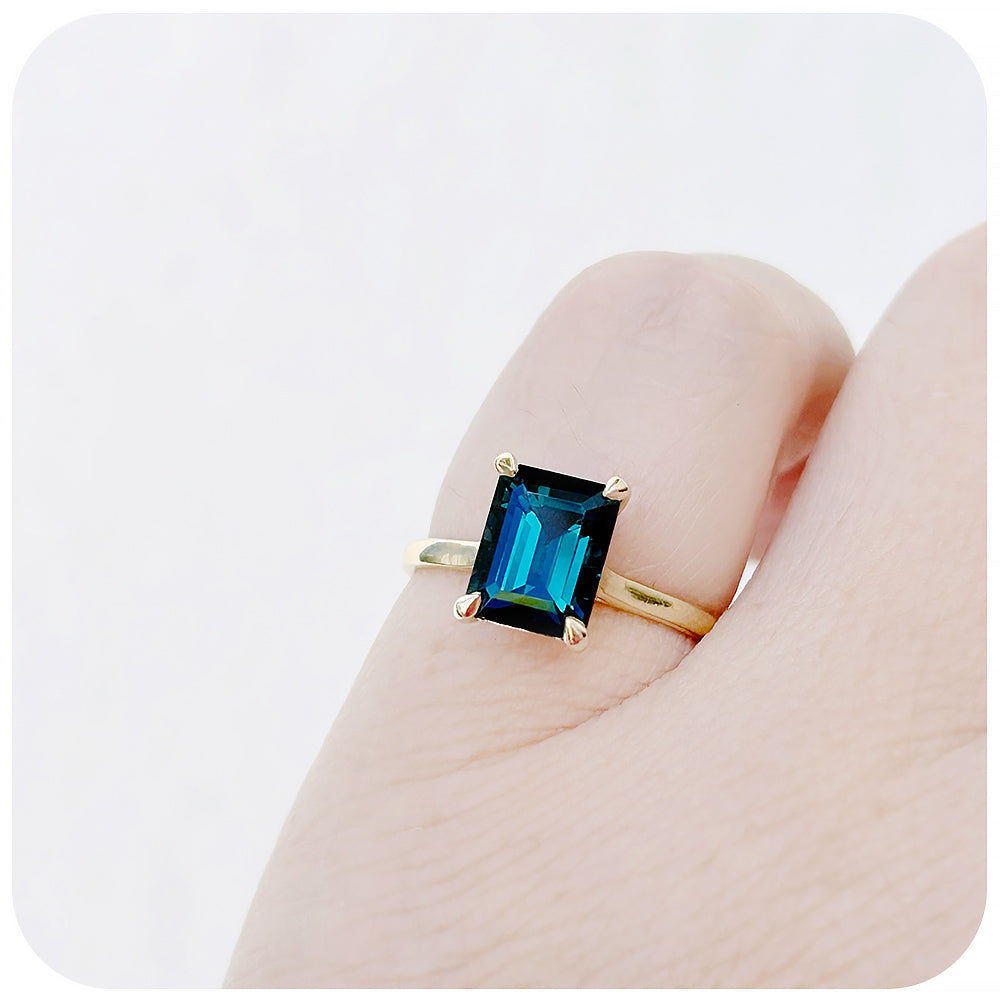 Emerald cut London Blue Topaz Solitaire Ring in Yellow Gold - Victoria's Jewellery