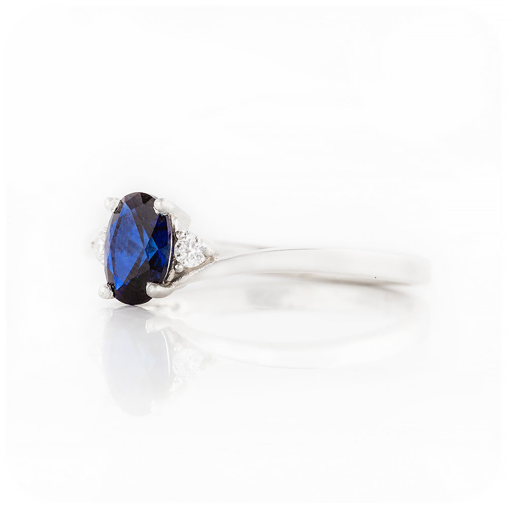 Oval cut Lab Grown Blue Sapphire and Moissanite Engagement Ring - Victoria's Jewellery
