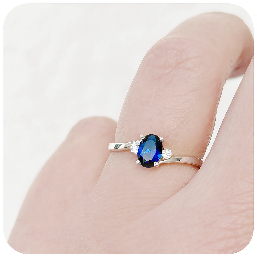 Oval cut Lab Grown Blue Sapphire and Moissanite Engagement Ring - Victoria's Jewellery