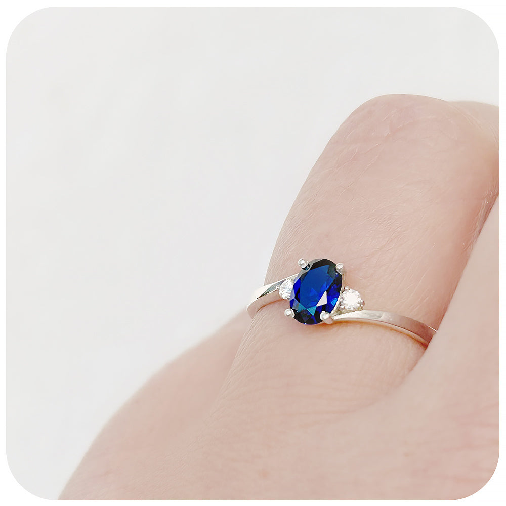 Oval cut Lab Grown Blue Sapphire and Moissanite Engagement Ring - Victoria's Jewellery