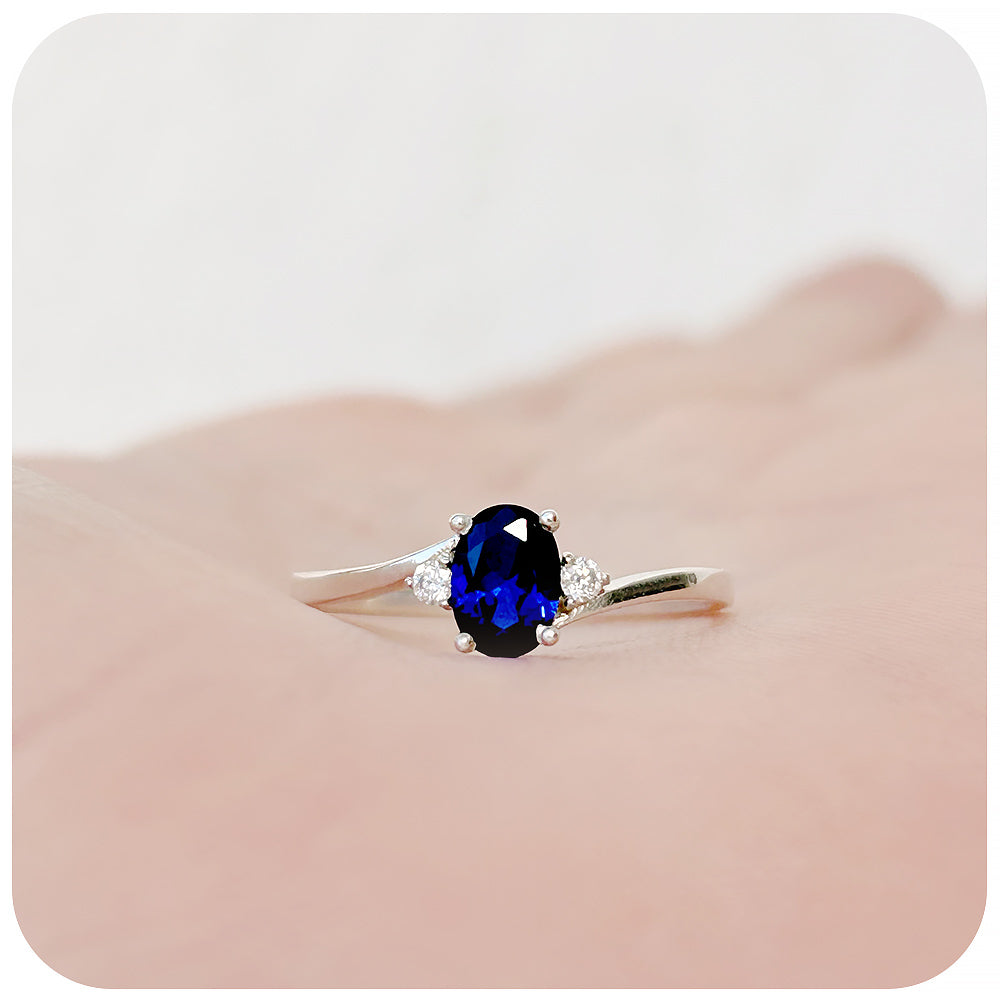 Oval cut Lab Grown Blue Sapphire and Moissanite Engagement Ring - Victoria's Jewellery