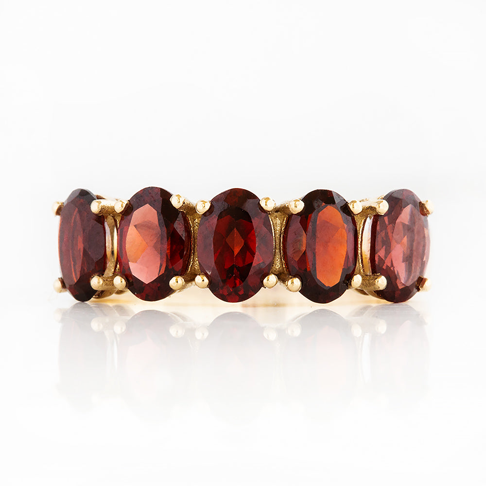 Oval cut Garnet Half Eternity Ring in Yellow Gold - Victoria's Jewellery
