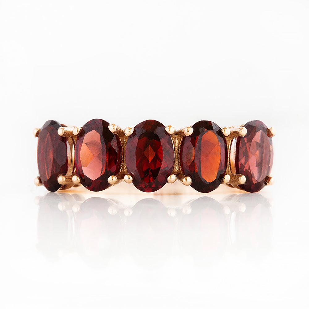 Oval cut Garnet Half Eternity Ring in Rose Gold - Victoria's Jewellery