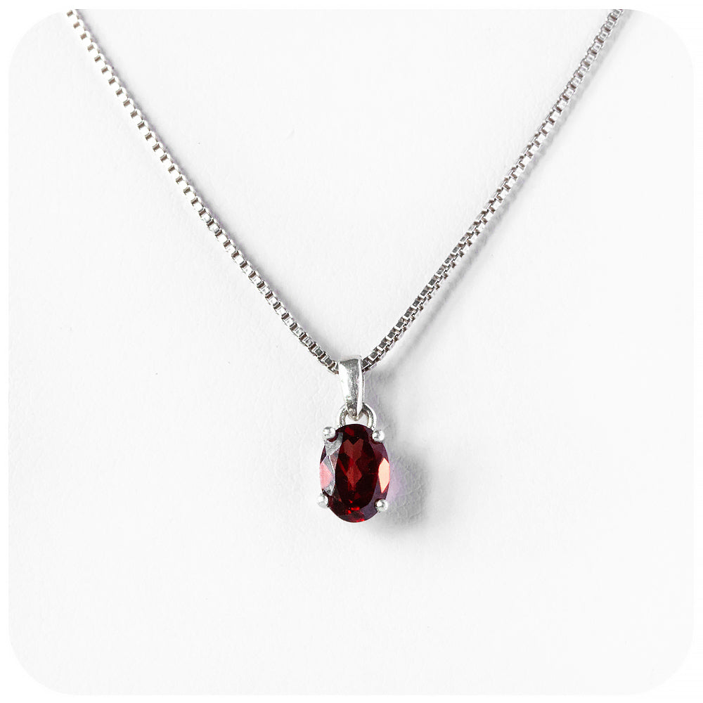 Luna, an Oval cut Garnet Pendant and Chain