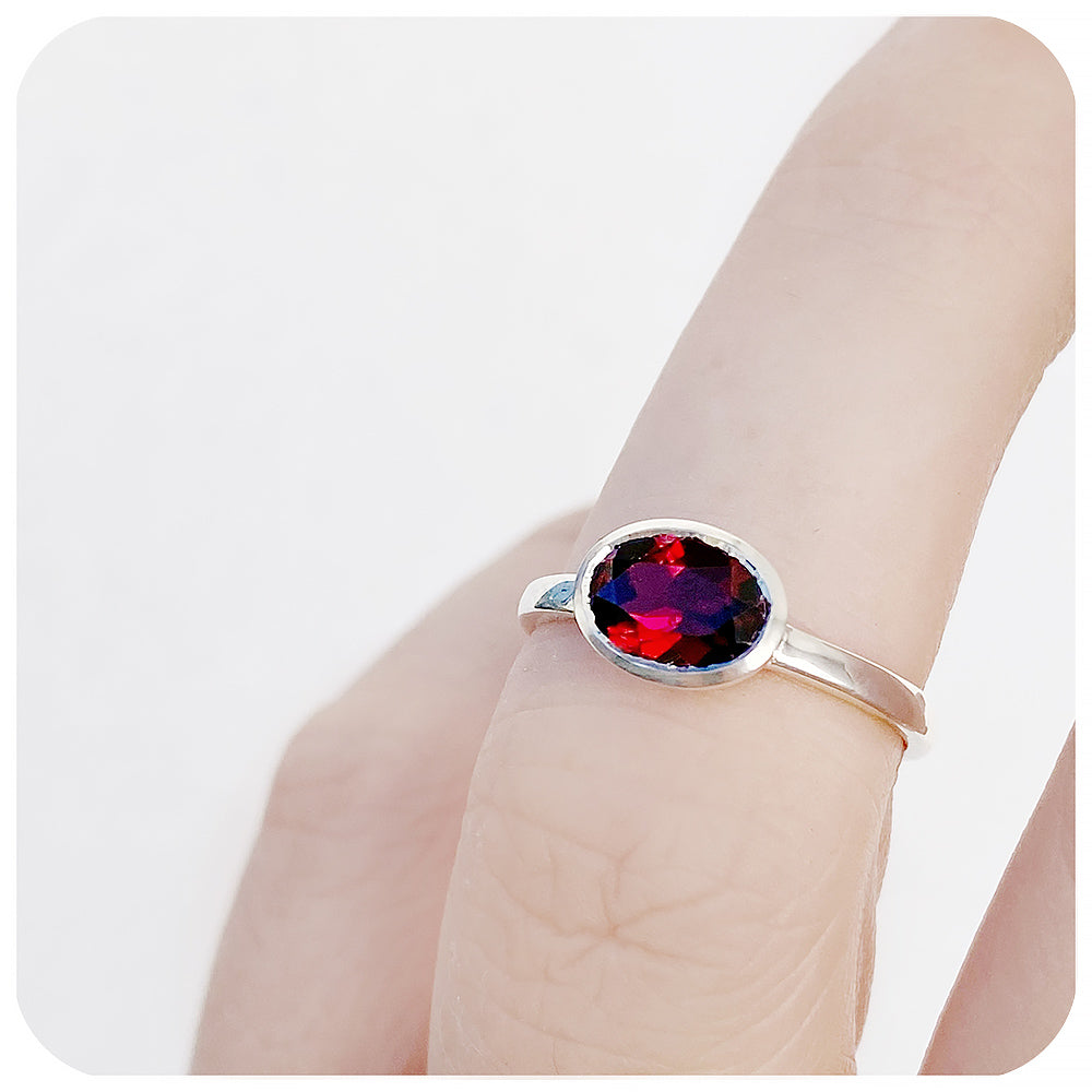 Oval cut Garnet tube bezel set solitaire ring - Victoria's Jewellery