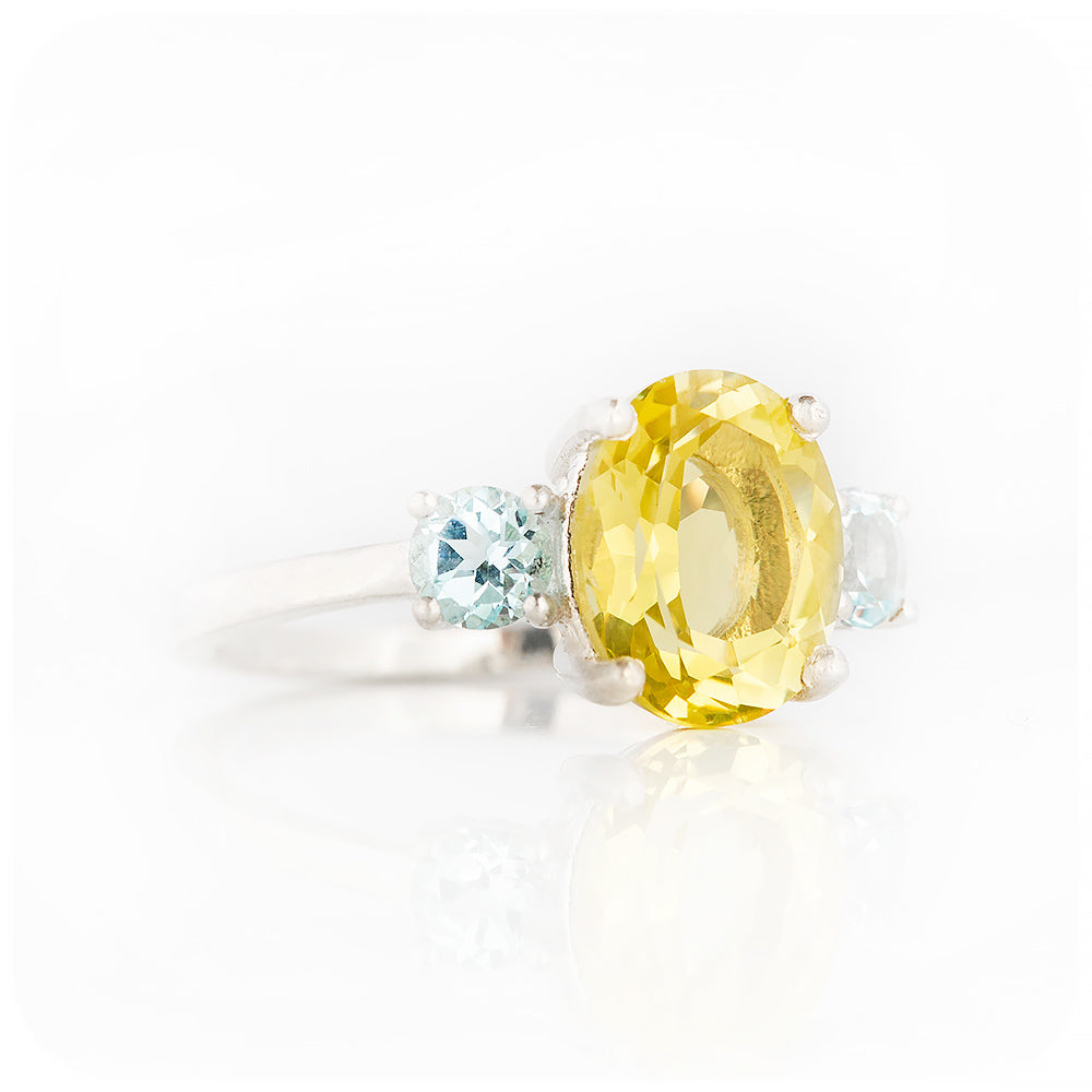 Oval cut Lemon Quartz and Blue Topaz Trilogy Ring - Victoria's Jewellery