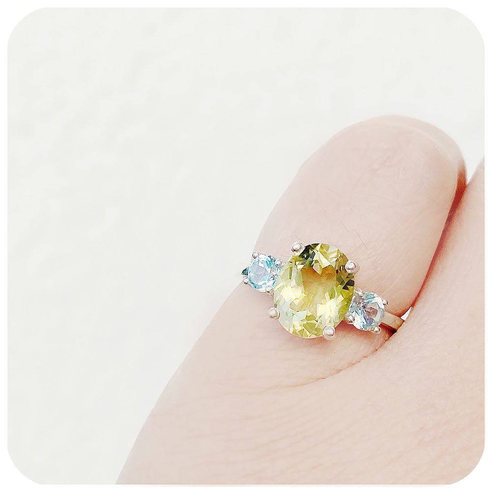 Oval cut Lemon Quartz and Blue Topaz Trilogy Ring - Victoria's Jewellery