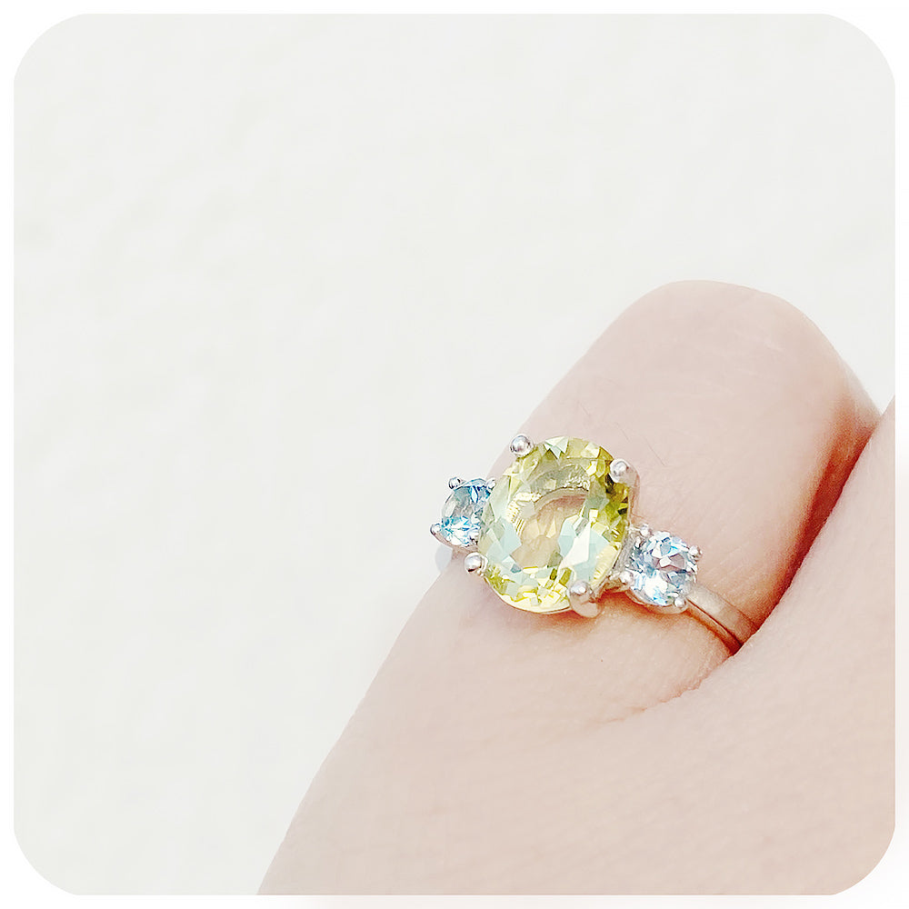 Oval cut Lemon Quartz and Blue Topaz Trilogy Ring - Victoria's Jewellery