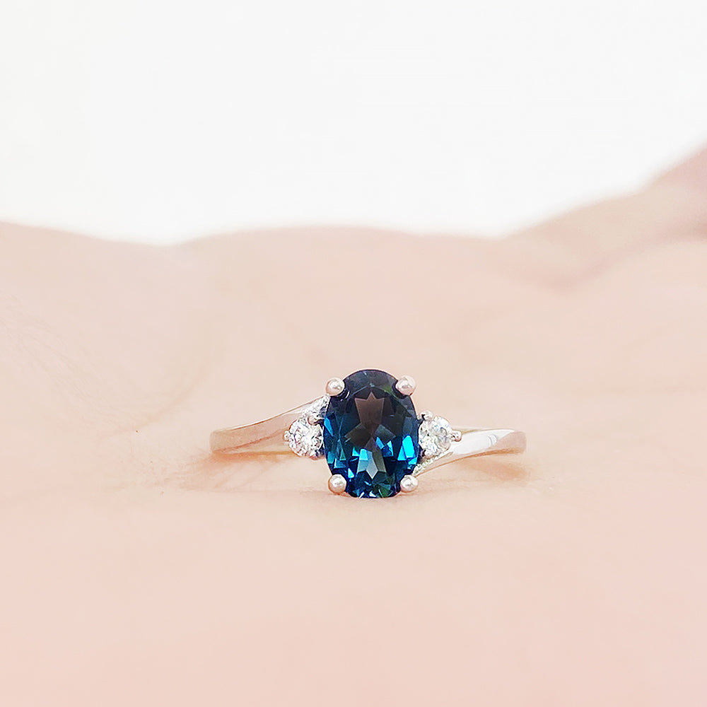 Georgie, a London Blue Topaz and Diamond Trilogy Ring