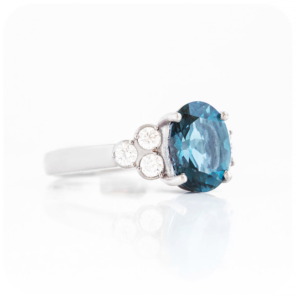 Oval cut London Blue Topaz and Moissanite Cluster Anniversary Ring - Victoria's Jewellery