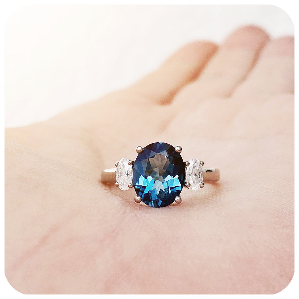 teal london blue topaz and moissanite oval cut trilogy engagement ring - Victoria's Jewellery