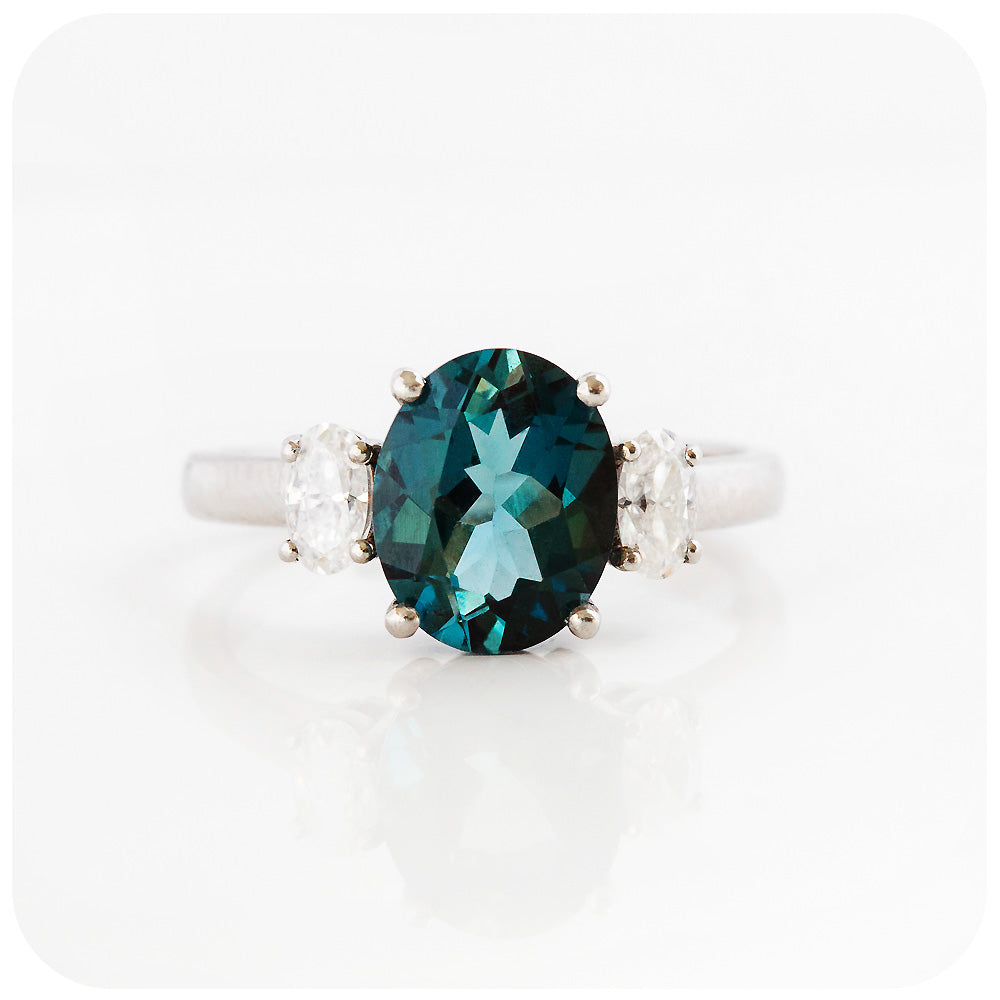 teal london blue topaz and moissanite oval cut trilogy engagement ring - Victoria's Jewellery