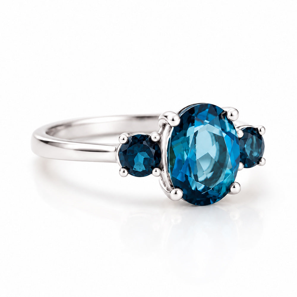 Hallie, London Blue Topaz Oval Trilogy Ring - Victoria's Jewellery
