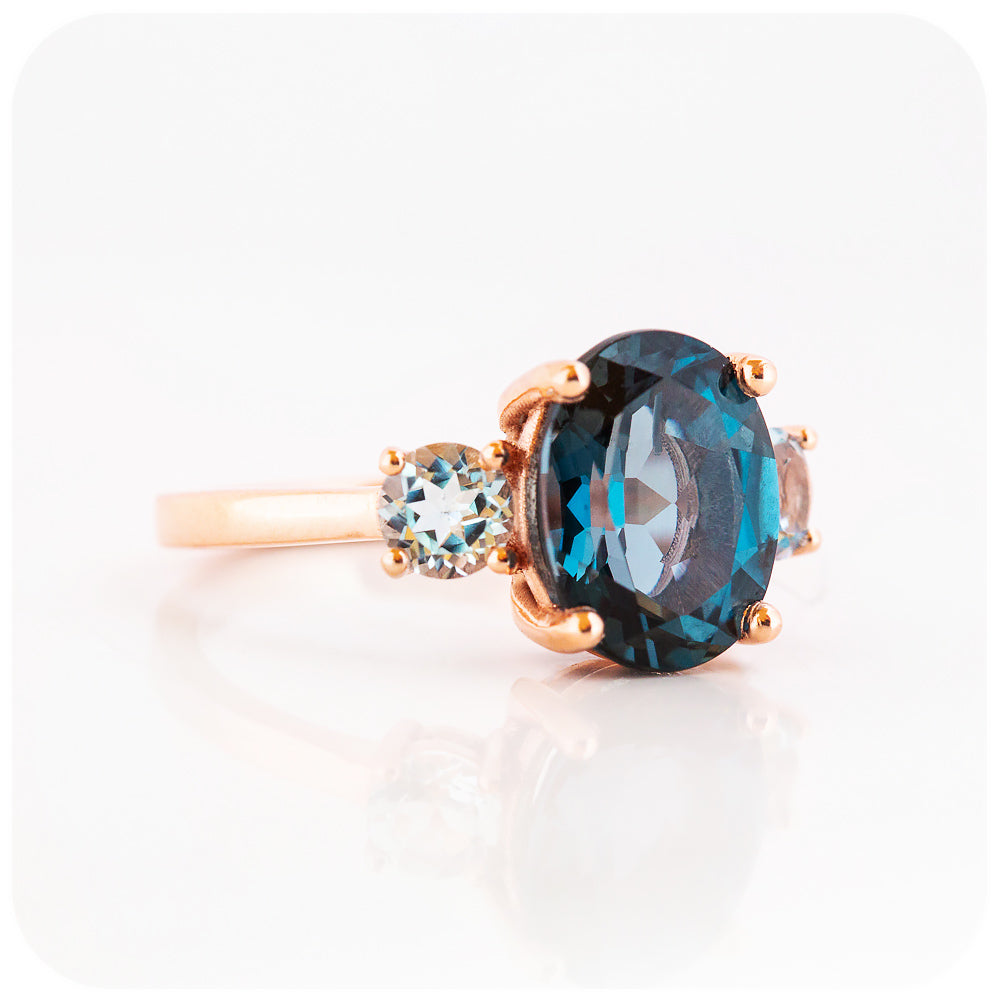 Oval cut London Blue Topaz and Sky Blue Topaz Trilogy Anniversary Ring - Victoria's Jewellery