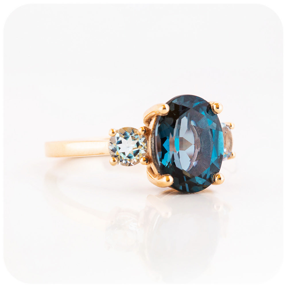 Oval cut London Blue Topaz and Sky Blue Topaz Trilogy Anniversary Ring - Victoria's Jewellery