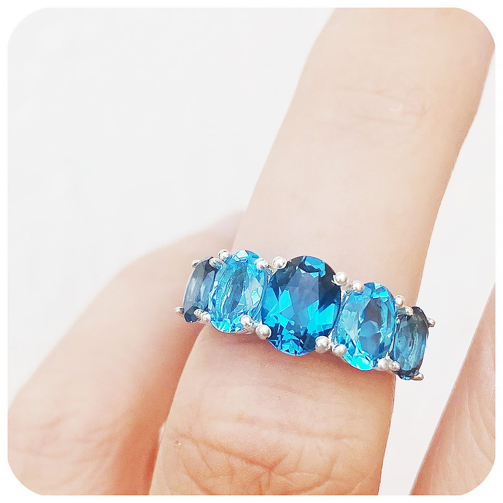 Oval cut Graduated London and Swiss Blue Topaz Anniversary or November Birthstone Ring - Victoria's Jewellery