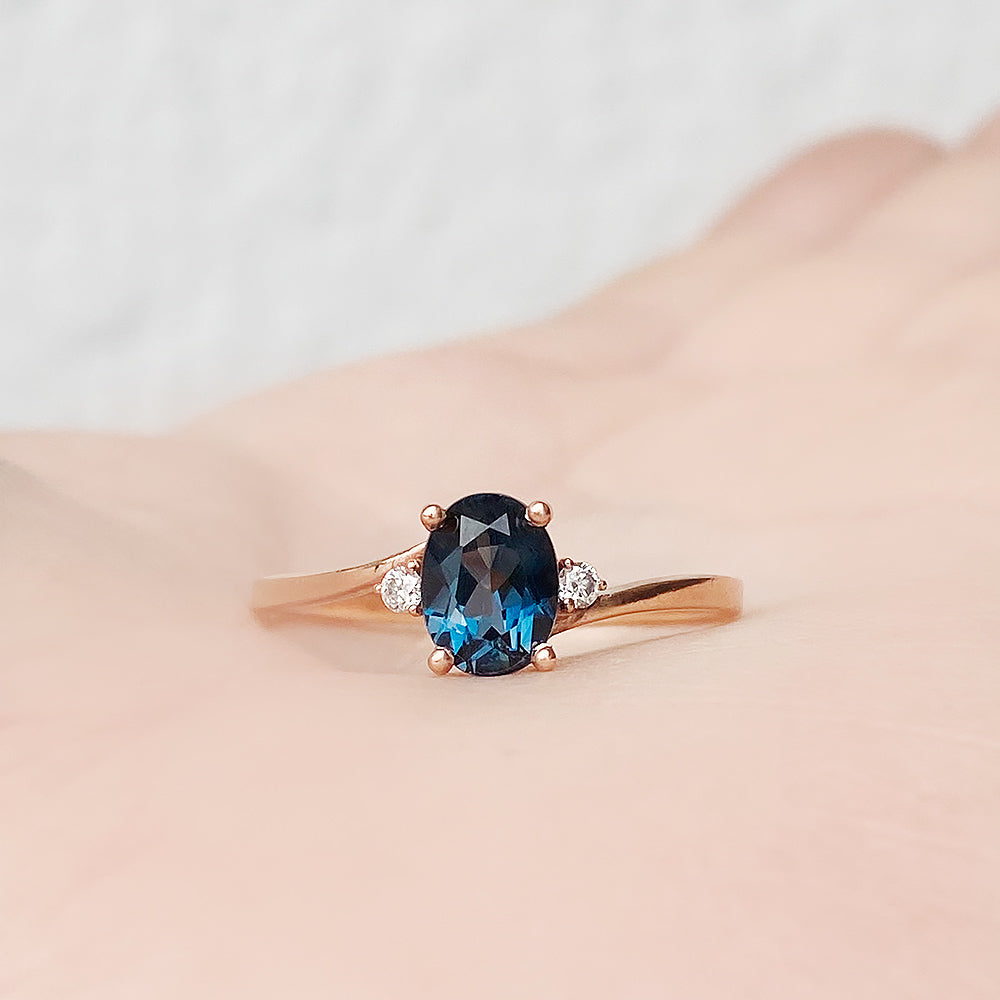 Georgie, a London Blue Topaz and Diamond Trilogy Ring