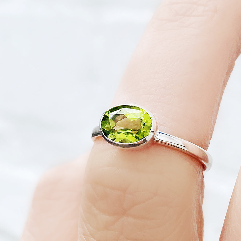 Quinn, an Oval cut Peridot Ring